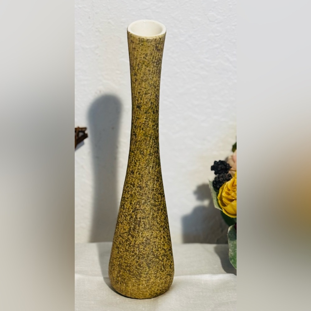 A unique mid century bud vase made by Shawnee Pottery in the 1950s